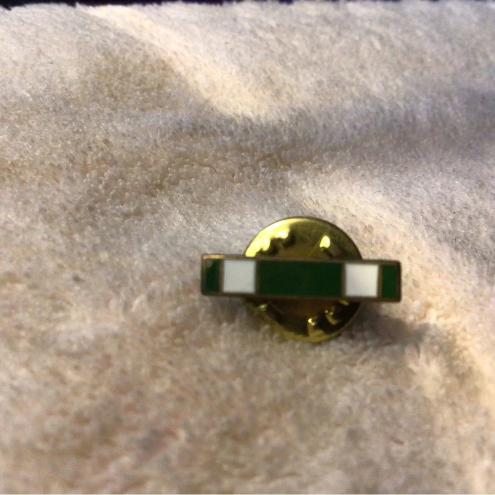 Green and White Enamel Lapel Pin with Gold Backing